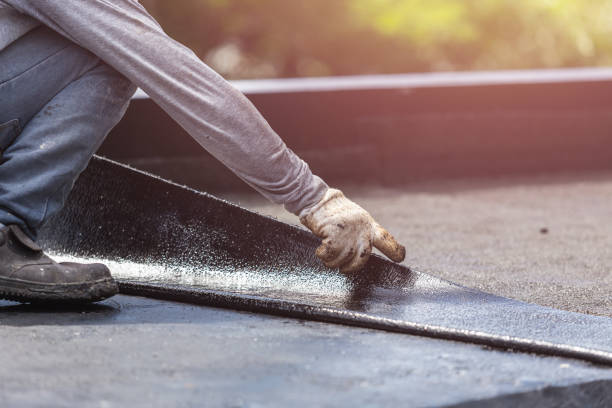 Professional Basement Waterproofing technician working in Sunfield, MI